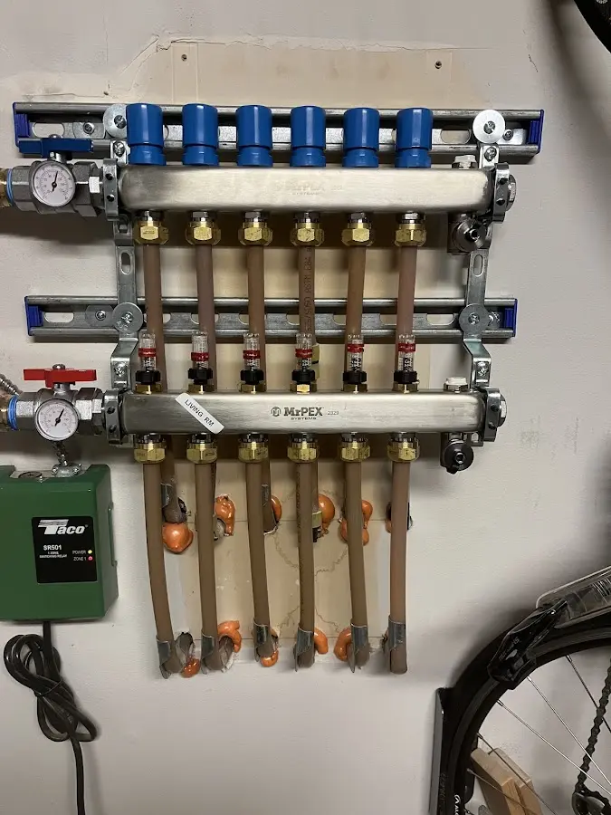 Plumber performing Gas Line Installation at a residential property in Chenango